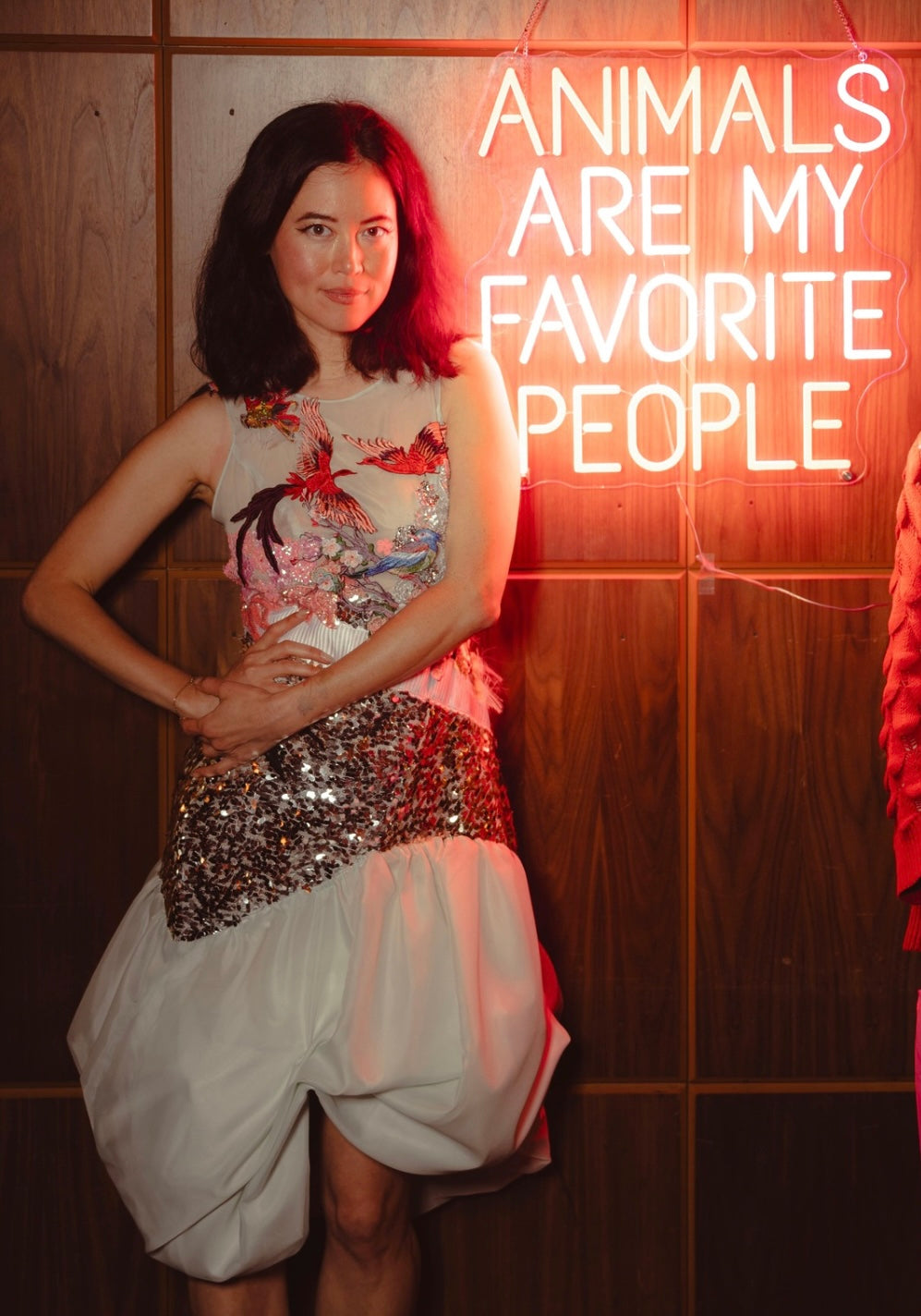 Leanne Mai-ly Hilgart, Vegan Fashion Designer, with a Neon Sign “Animals Are My Favorite People” for AnimalPeople at the Phoenix Hotel, photographed by Winston Chen.
